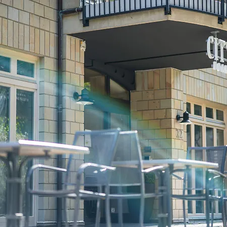 Апарт-отель Cityhome Am Kurpark Бад-Зальцуфлен